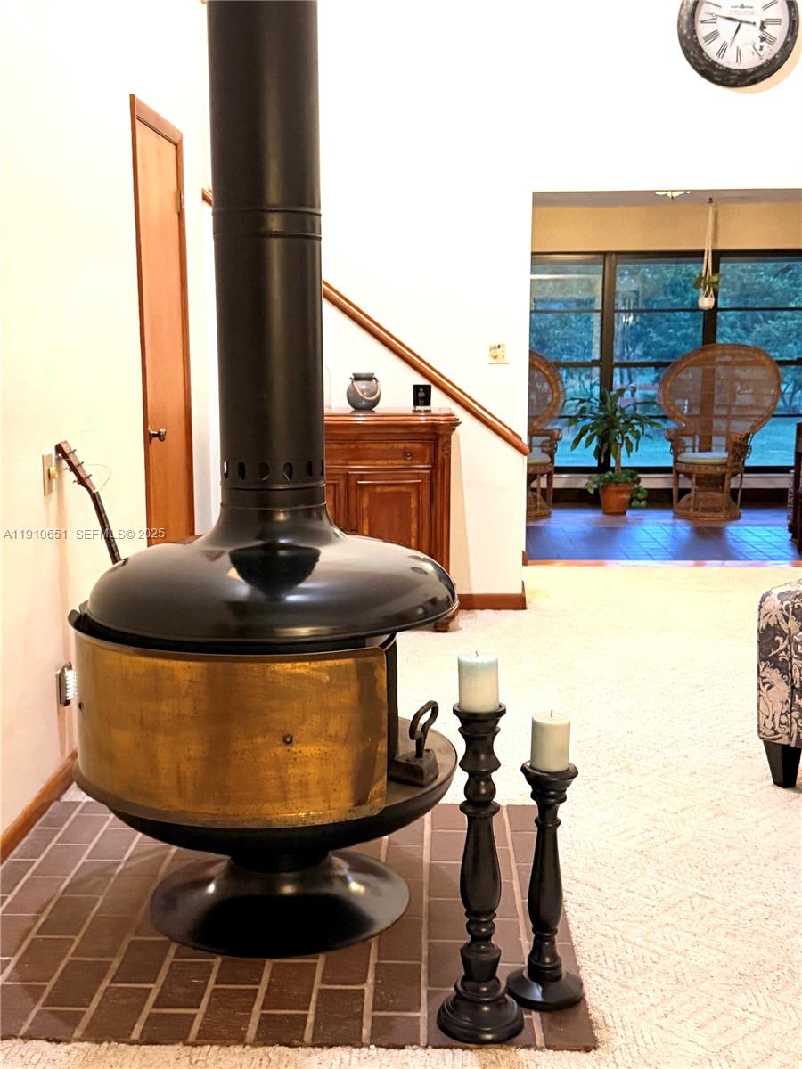 19820 Southwest 244th Street Homestead, FL 33031 - Photo 13 of 99 a room with table and chairs