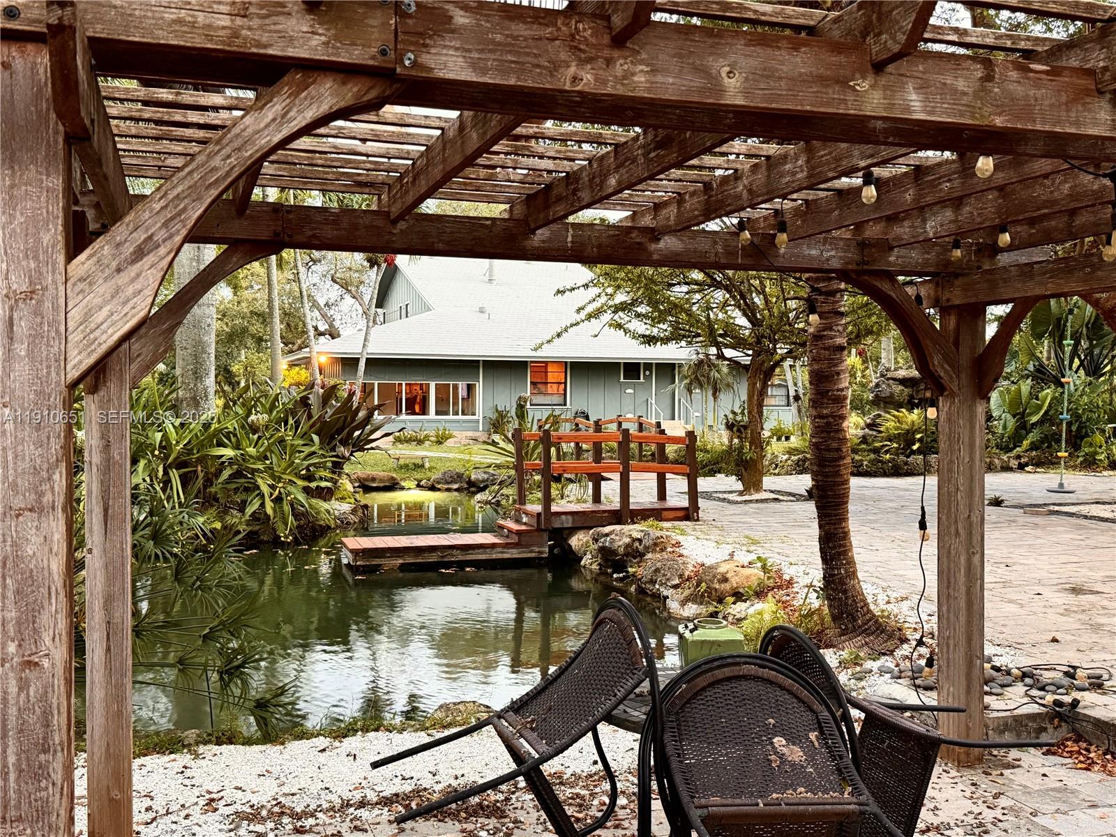 19820 Southwest 244th Street Homestead, FL 33031 - Photo 51 of 99 Pergola Dining