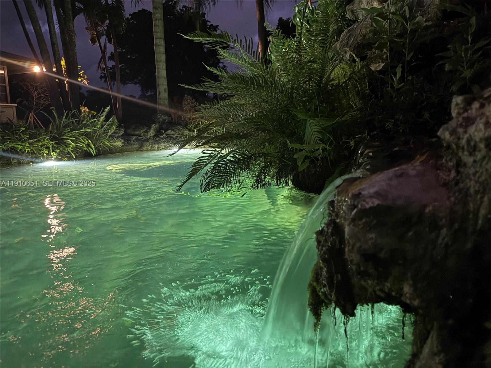 19820 Southwest 244th Street Homestead, FL 33031 - Photo 71 of 99 a backyard of a house with lots of green space and garden