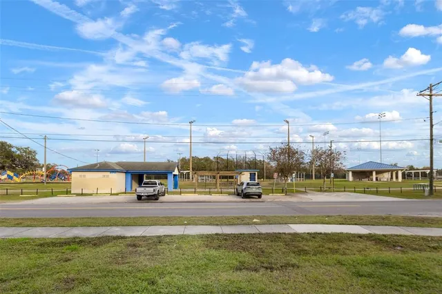 a view of water with a building in the background