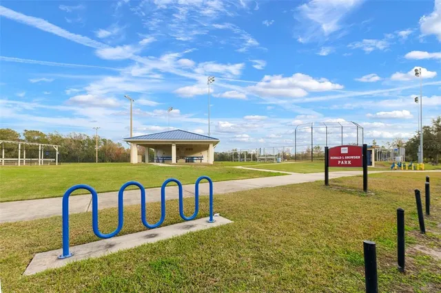 a view of swimming pool with seating space