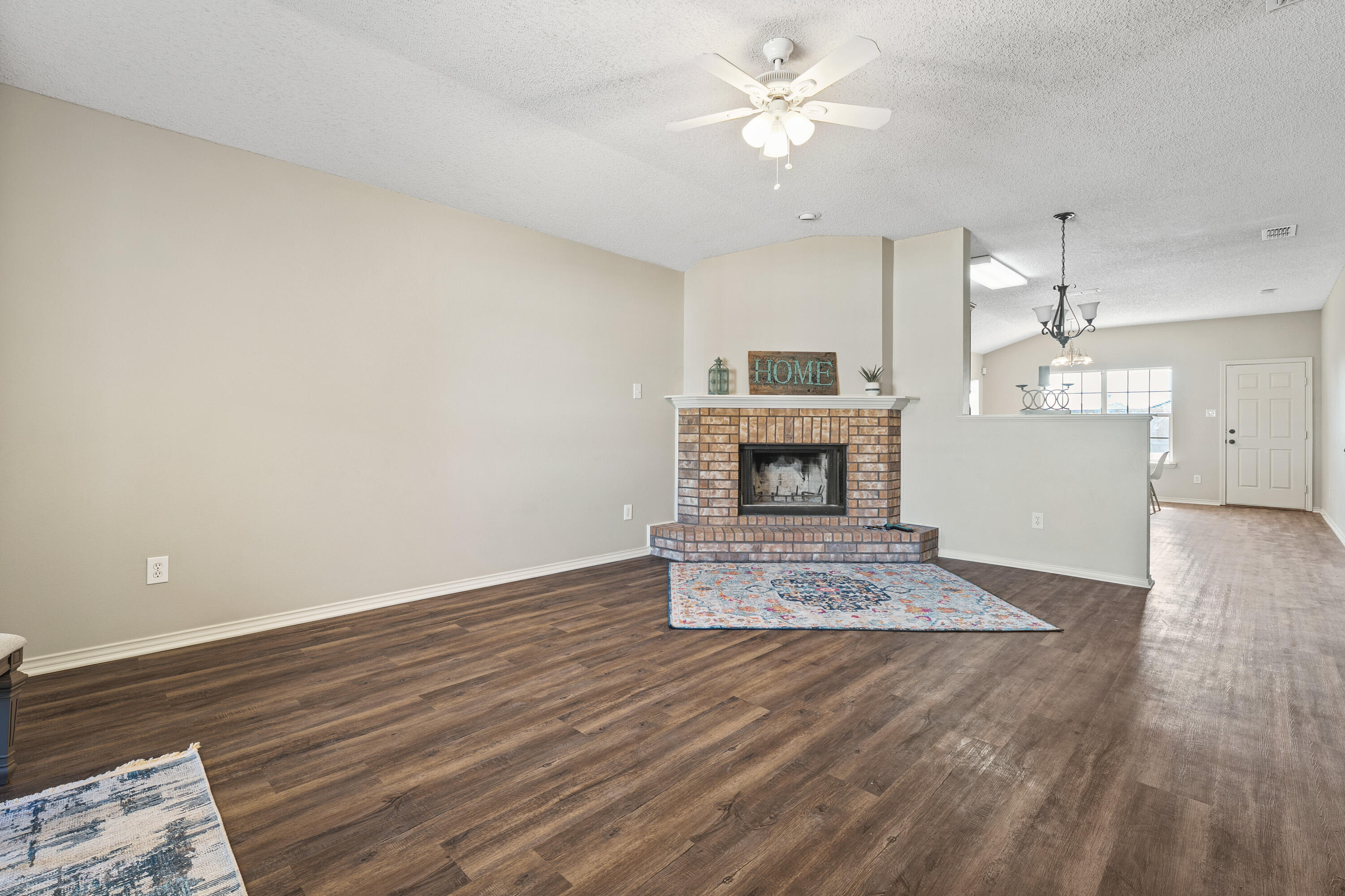 6517 91st Street Lubbock, TX 79424 - Photo 2 of 11 a view of kitchen and an empty room