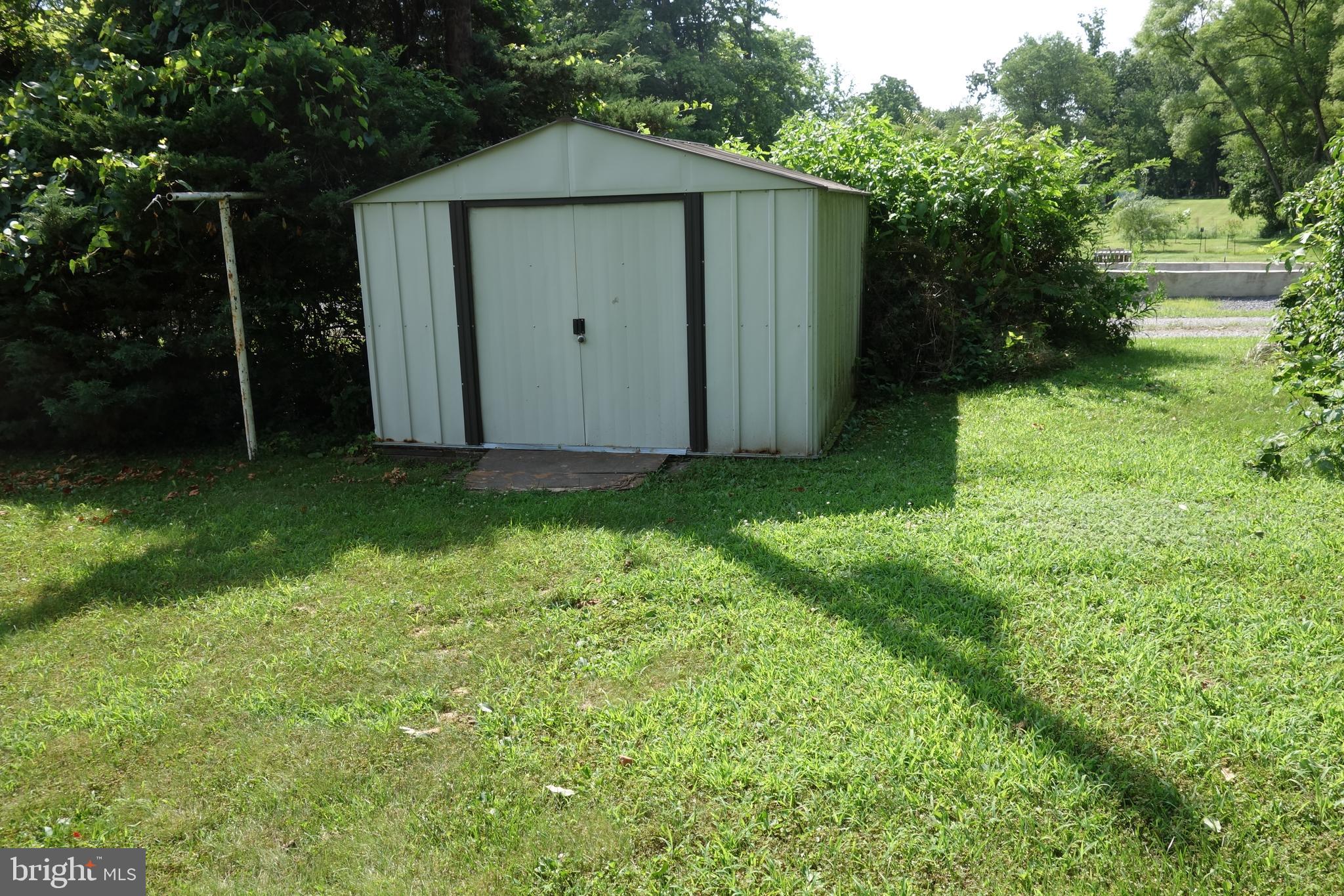769 Knob Hill Road Fayetteville, PA 17222 - Photo 17 of 56 a view of a small house with a yard