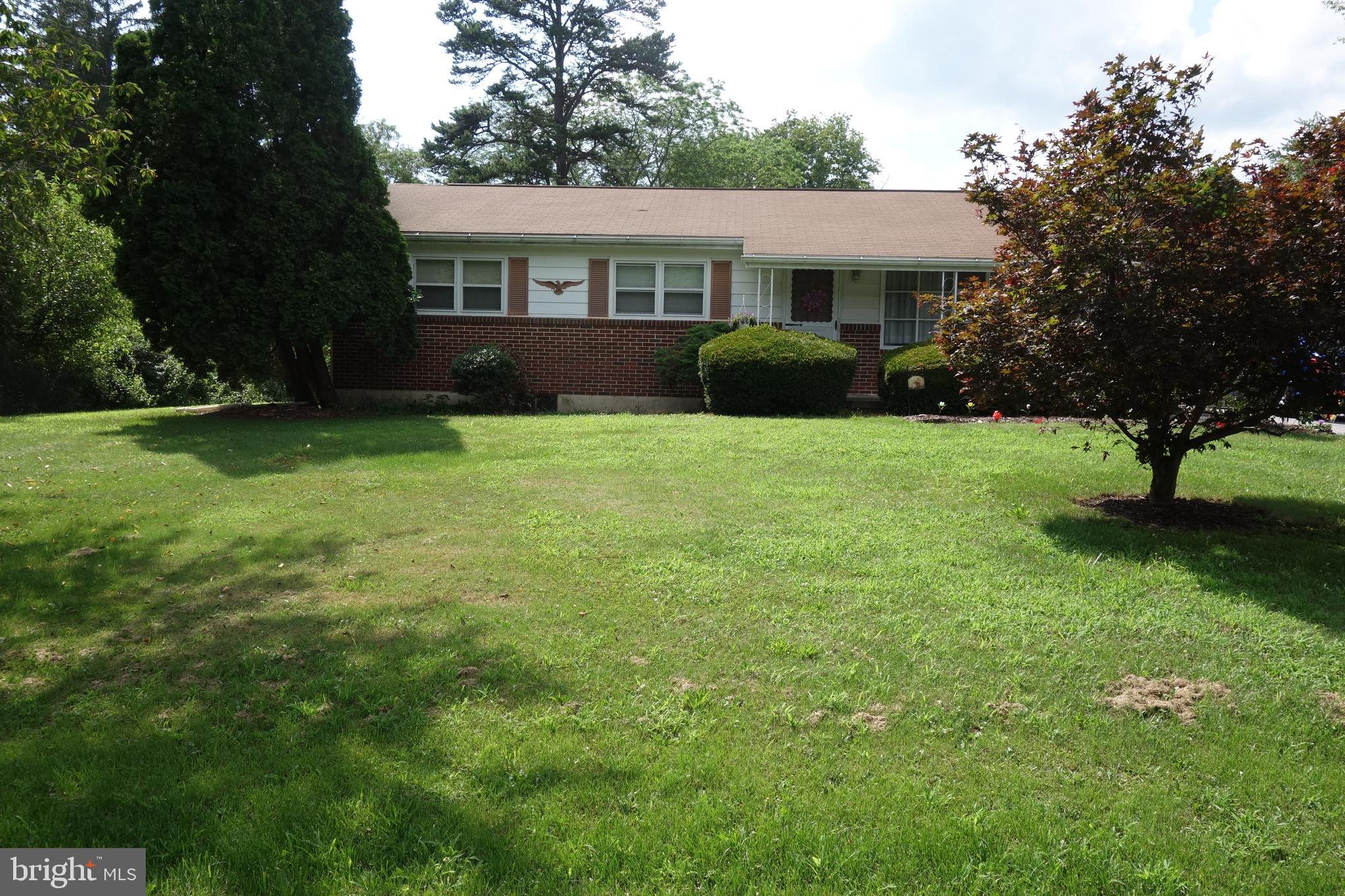 769 Knob Hill Road Fayetteville, PA 17222 - Photo 2 of 56 a view of a house with backyard and garden