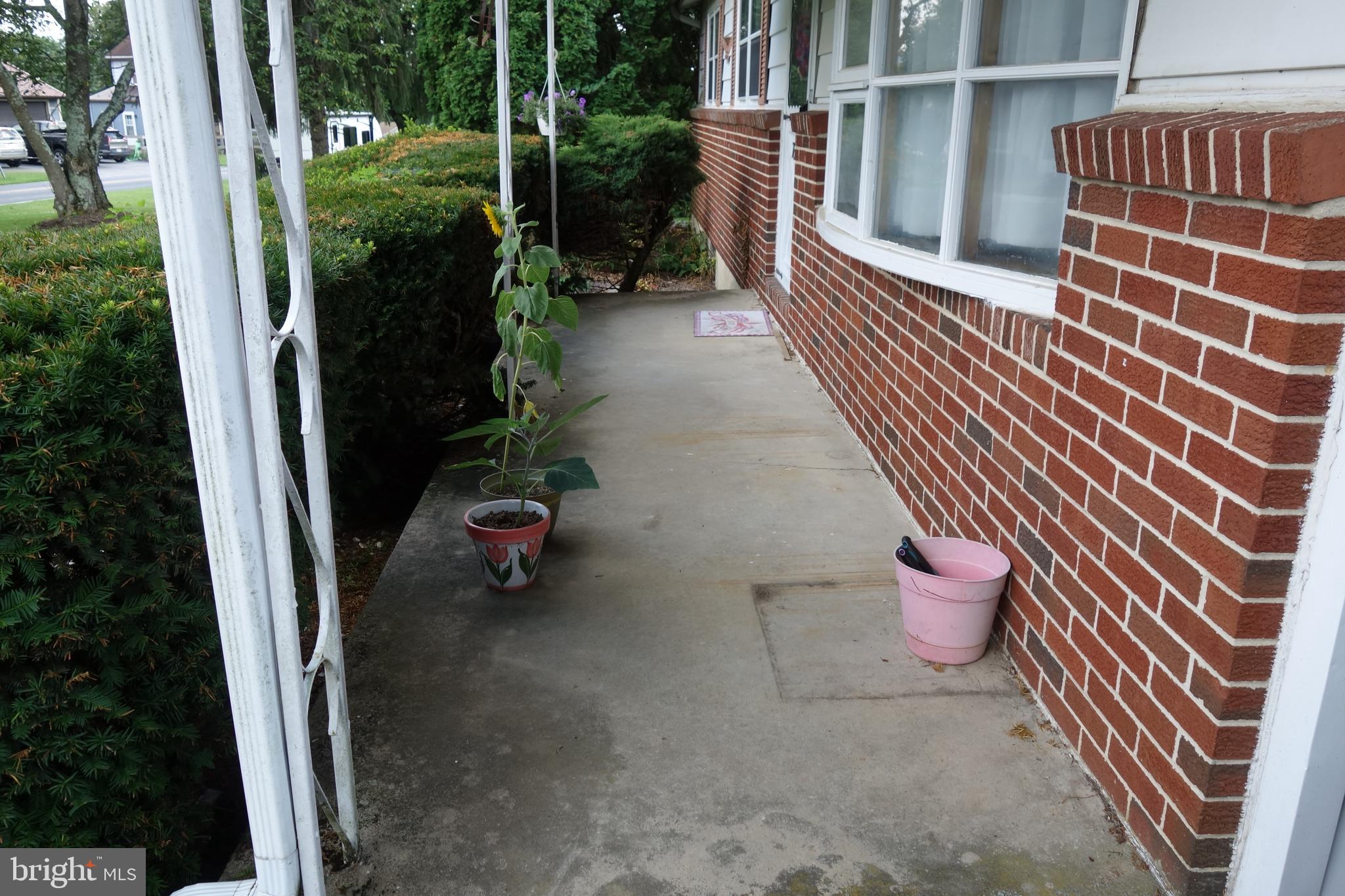 769 Knob Hill Road Fayetteville, PA 17222 - Photo 23 of 56 a backyard of a house with outdoor seating