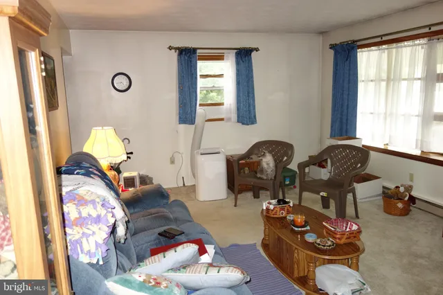 a view of kitchen sink and cabinets