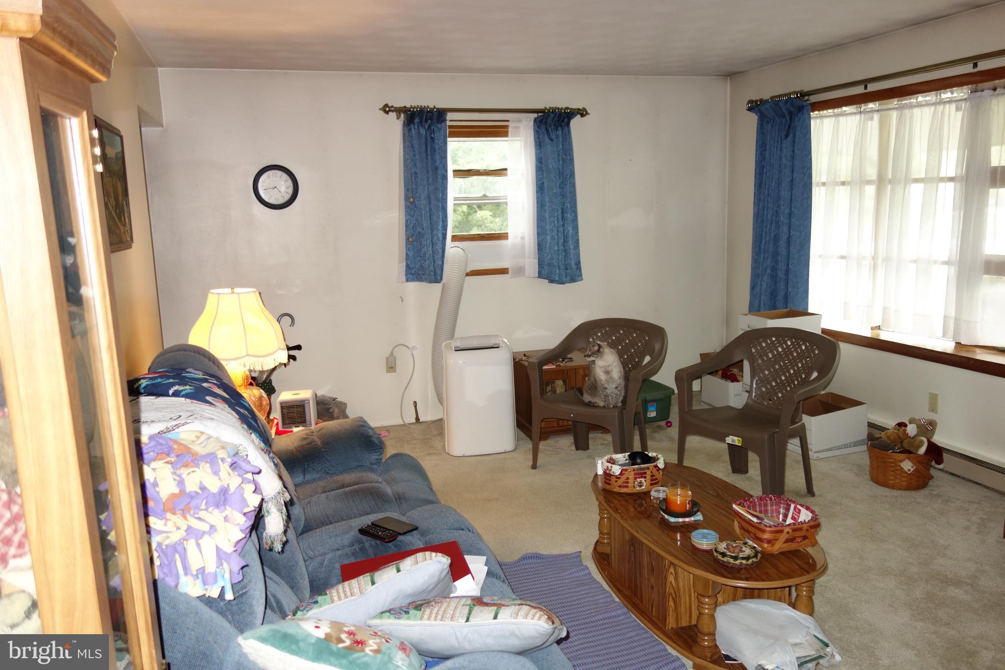 769 Knob Hill Road Fayetteville, PA 17222 - Photo 28 of 56 a living room with furniture and a window
