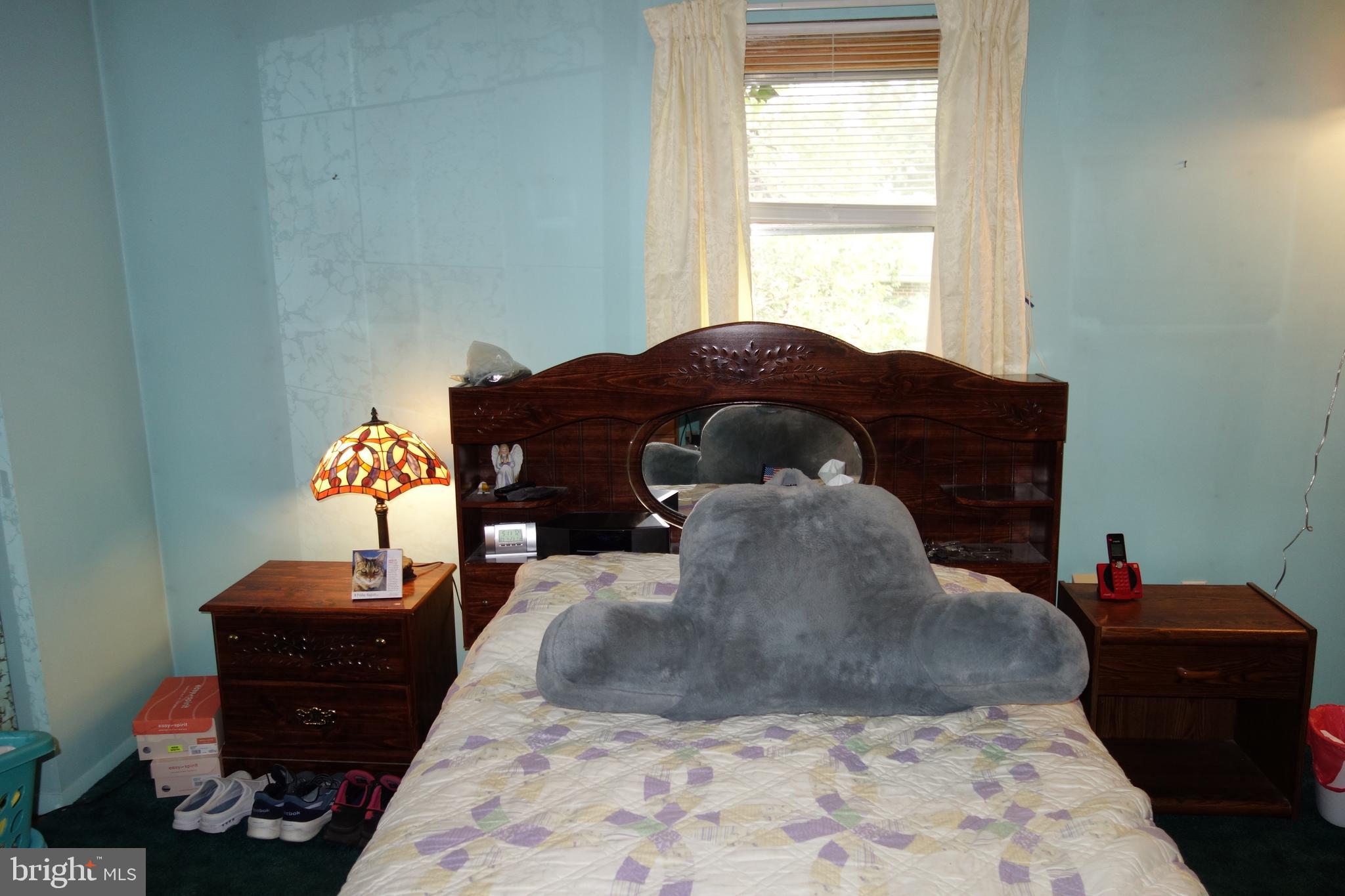 769 Knob Hill Road Fayetteville, PA 17222 - Photo 45 of 56 a large bed and a lamp on a table