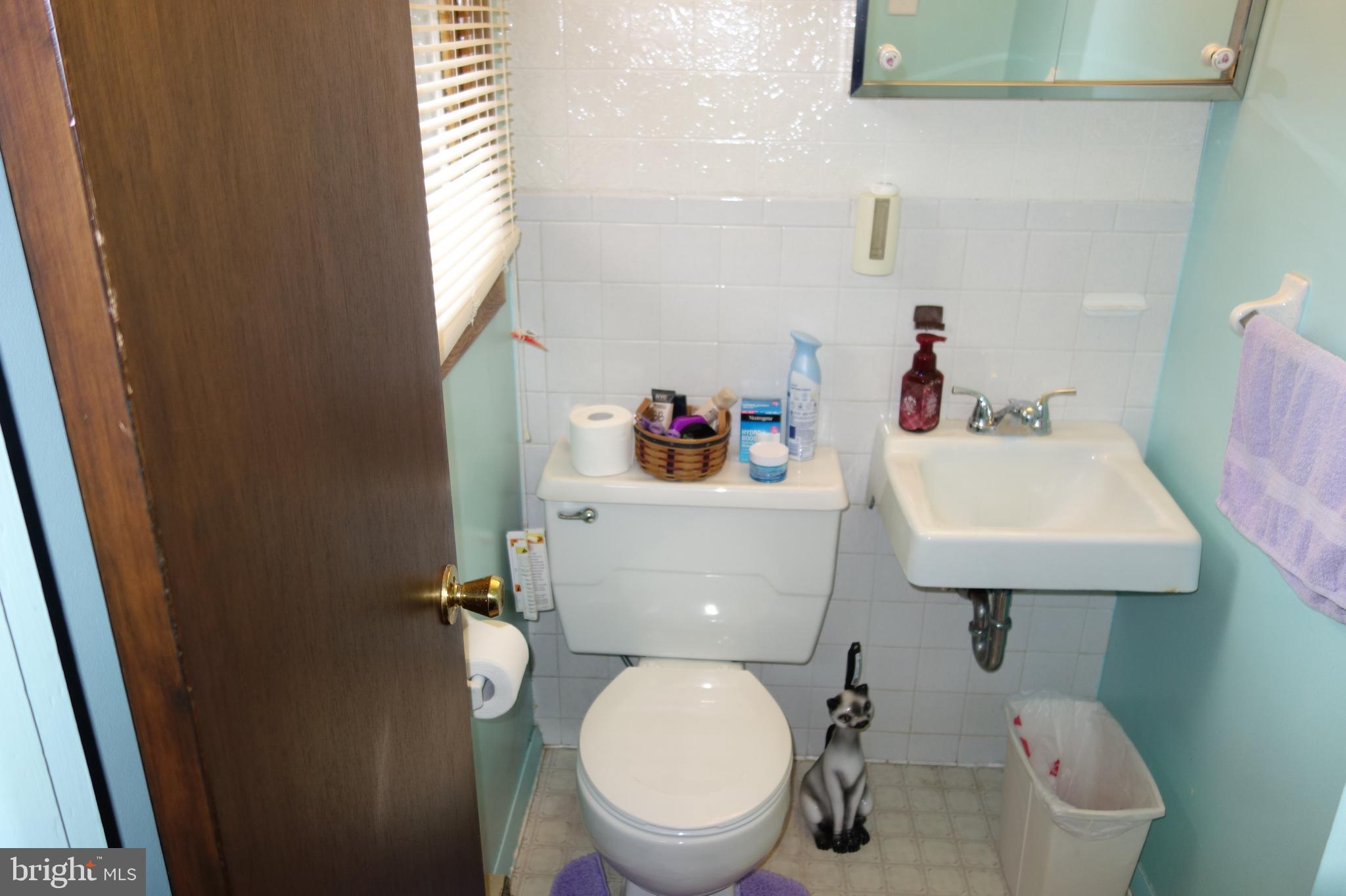 769 Knob Hill Road Fayetteville, PA 17222 - Photo 50 of 56 a white toilet sitting next to a bathroom sink