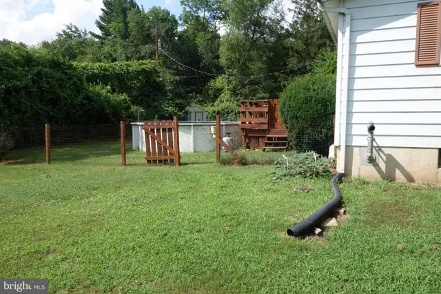 a view of a garden from a balcony