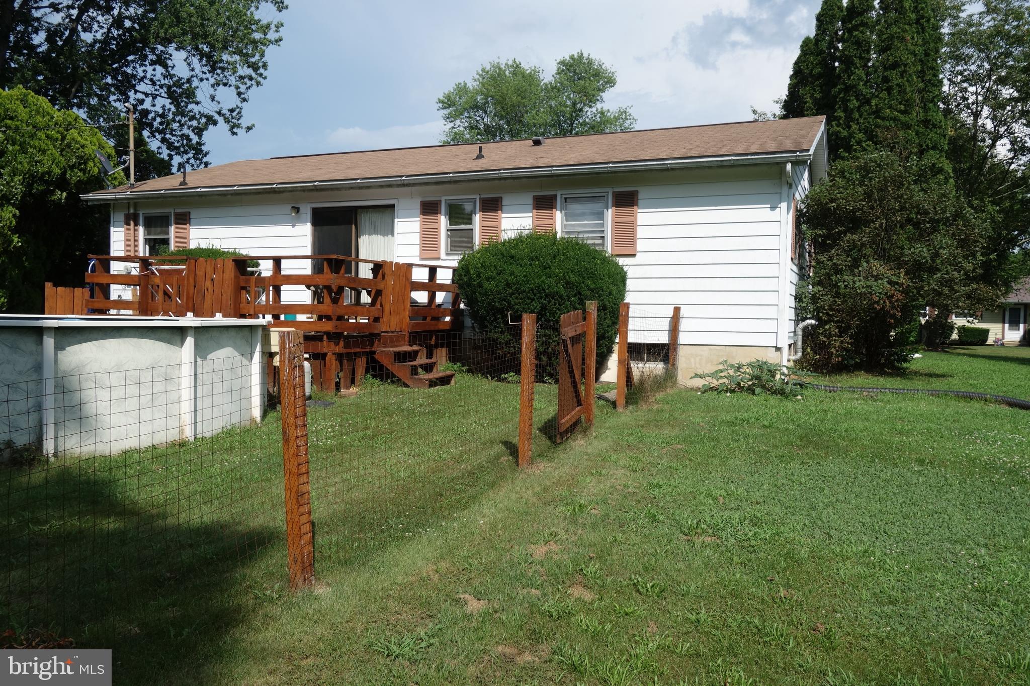 769 Knob Hill Road Fayetteville, PA 17222 - Photo 8 of 56 a view of a house with a yard and sitting area