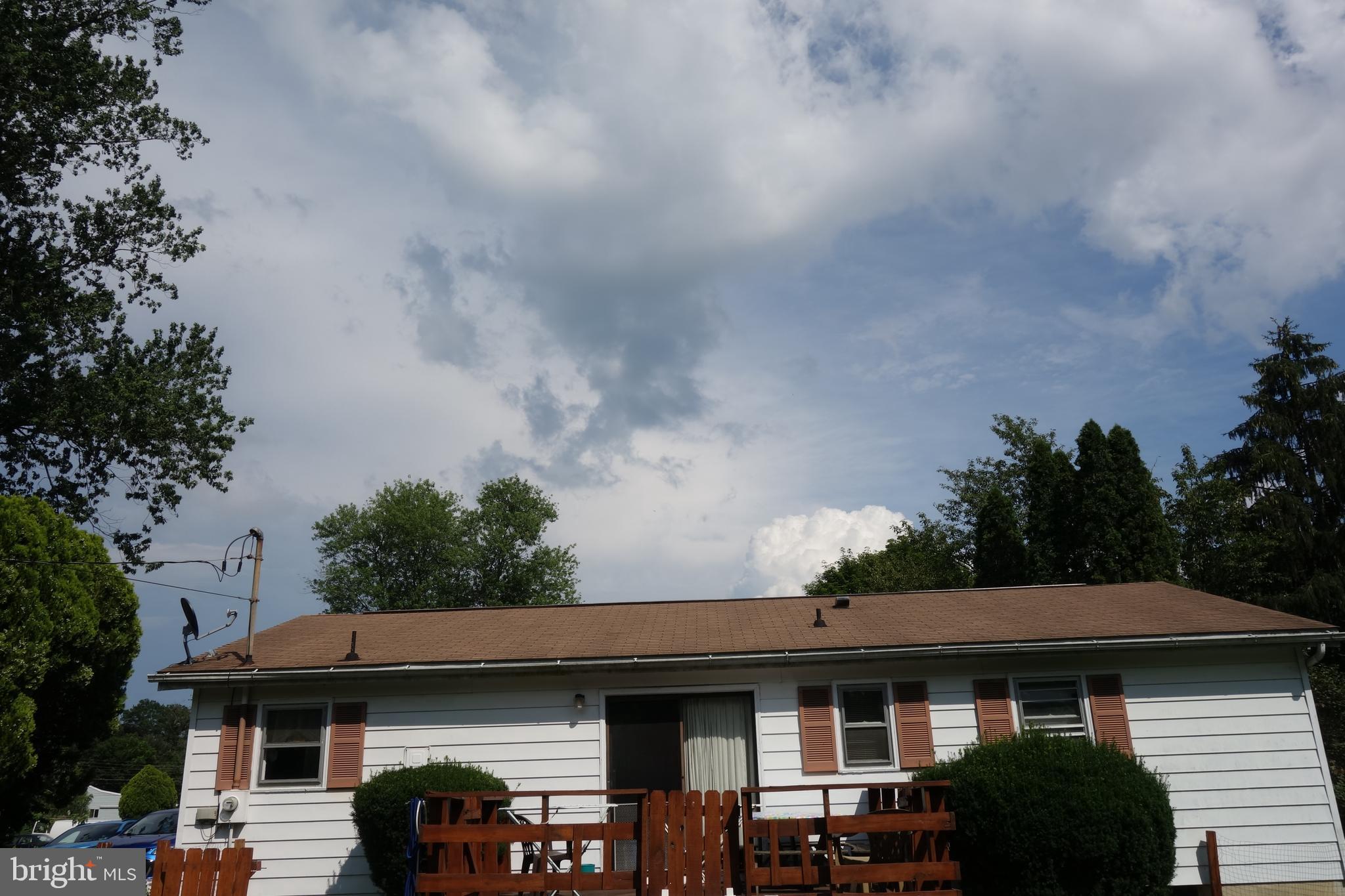769 Knob Hill Road Fayetteville, PA 17222 - Photo 10 of 56 a front view of a house with garden