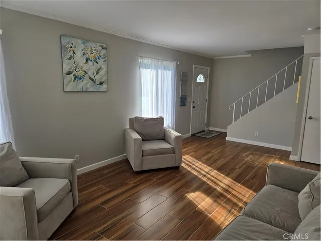 a living room with furniture and a couch