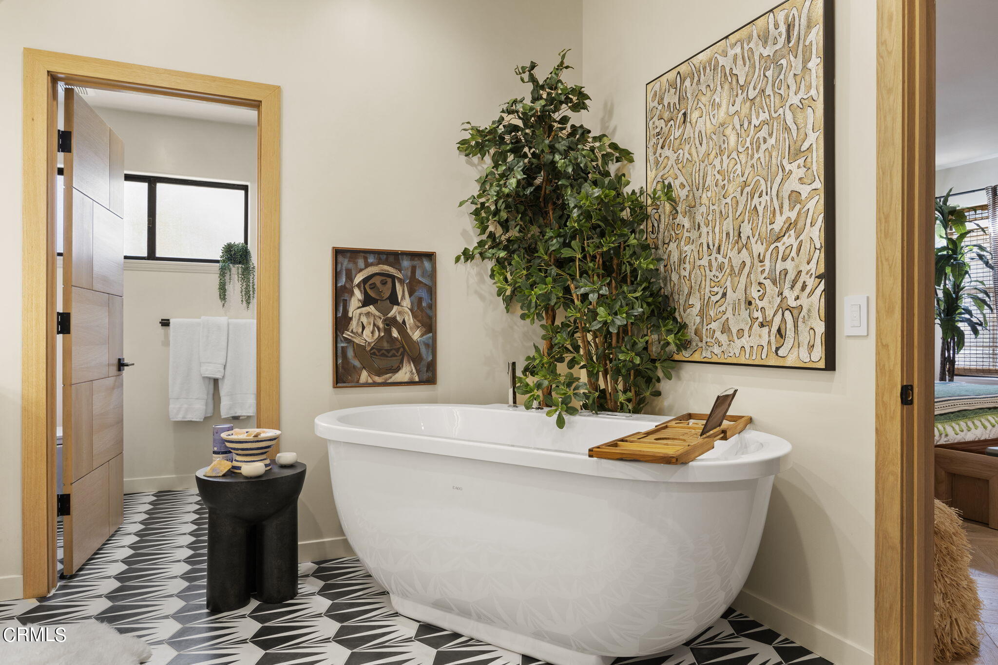 4136 Ocean Drive Oxnard, CA 93035 - Photo 20 of 58 a living room with a couch and a potted plant