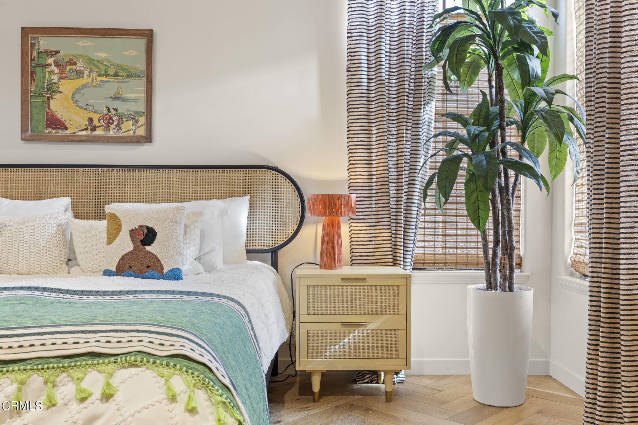 4136 Ocean Drive Oxnard, CA 93035 - Photo 2 of 58 a bedroom with a bed and a painting on the wall