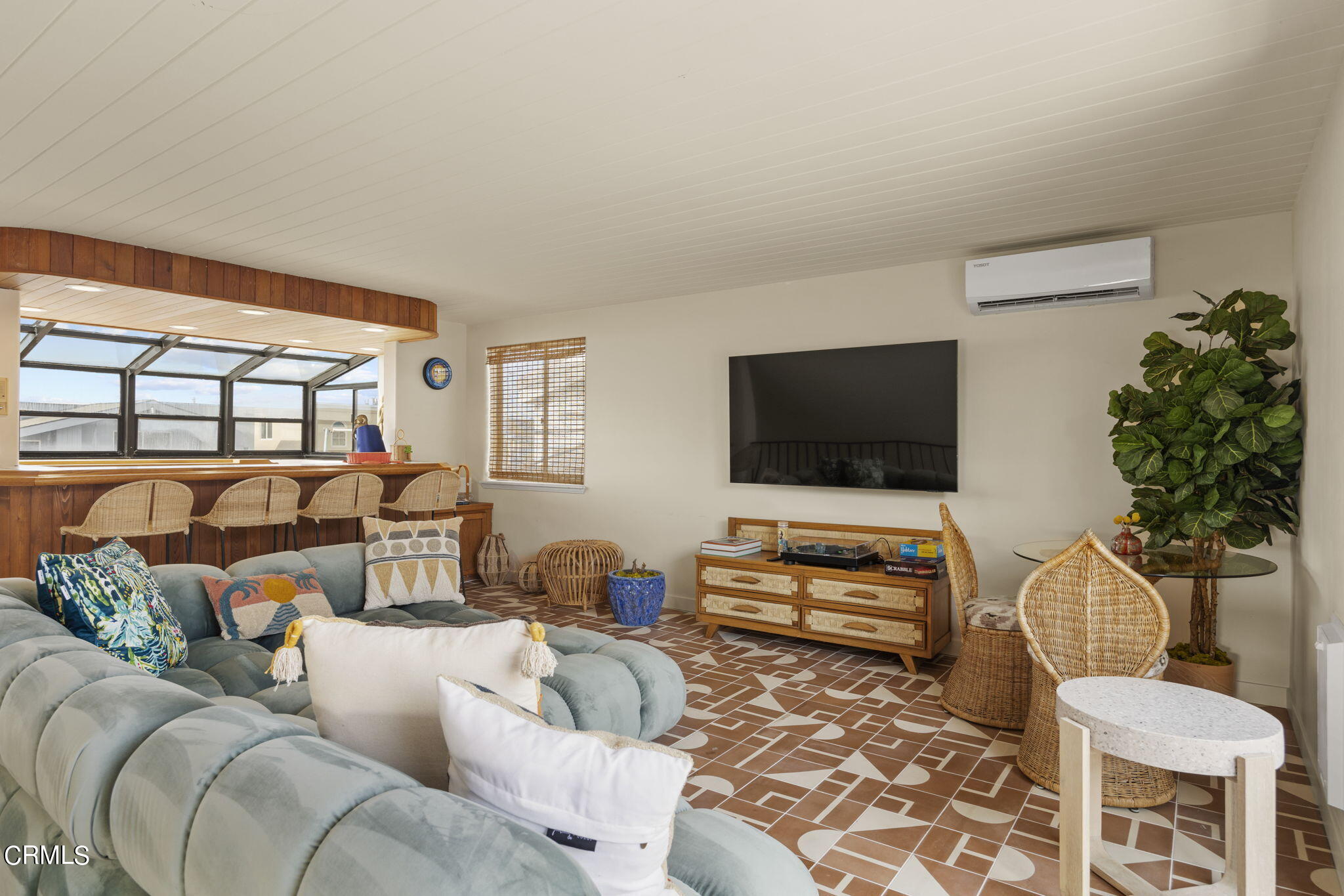 4136 Ocean Drive Oxnard, CA 93035 - Photo 34 of 58 a living room with furniture and a flat screen tv