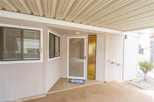 a view of a hallway with wooden walls