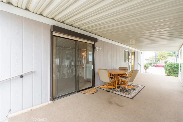 a building outdoor space with patio furniture