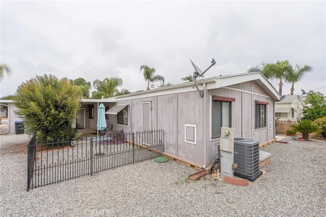 an aerial view of a house with a lake view