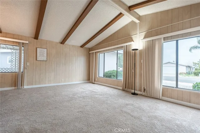 a view of a hallway with windows