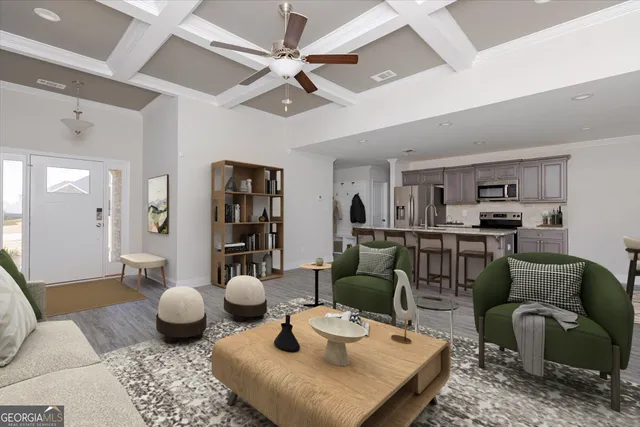 a living room with furniture and a view of kitchen