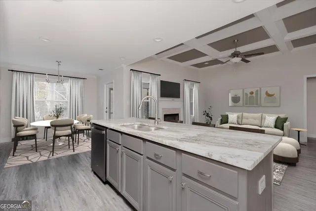 a view of living room with granite countertop furniture and fireplace