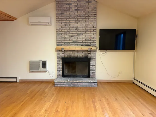 a living room with a fireplace
