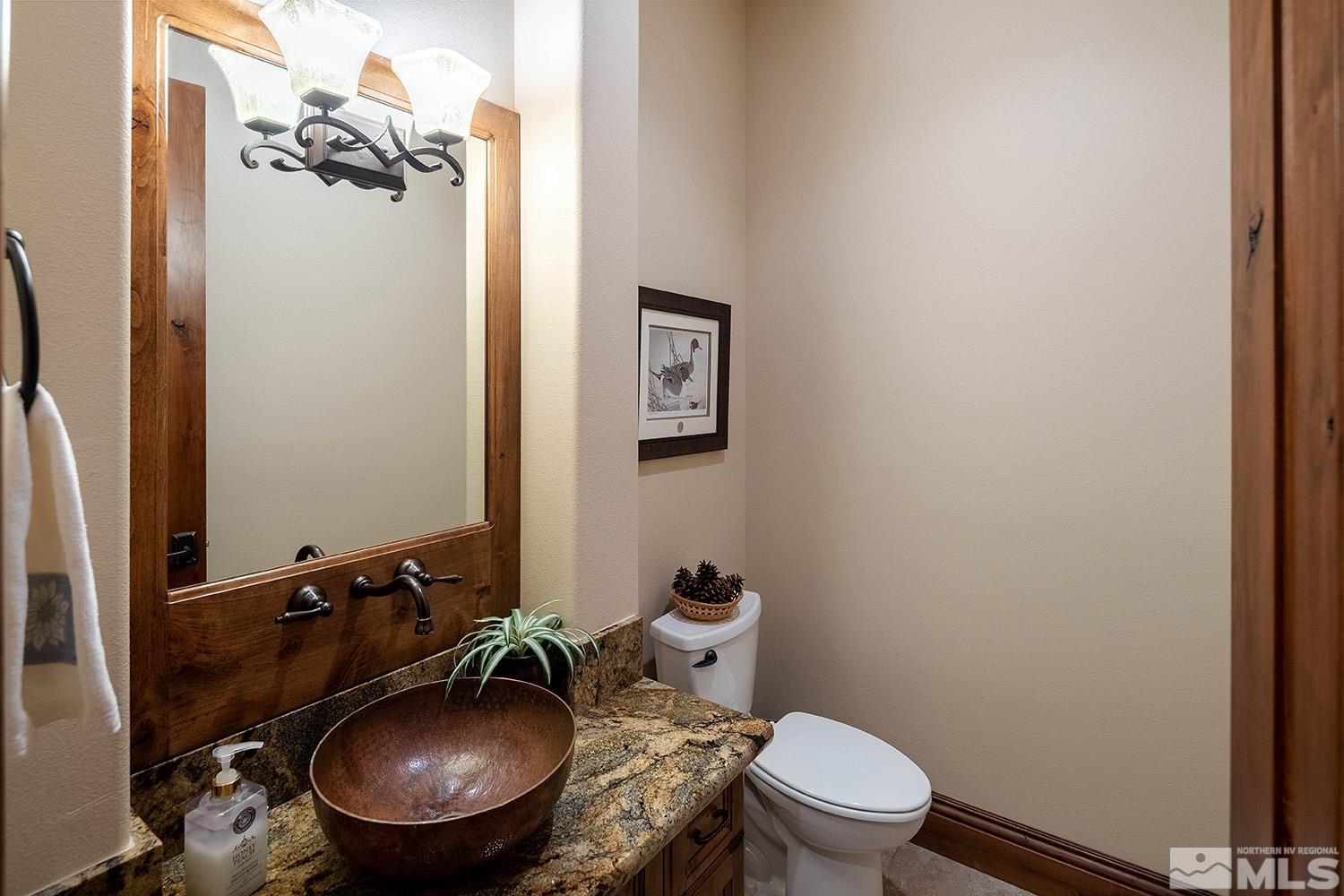 3745 Boulder Patch Reno, NV 89511 - Photo 20 of 40 a bathroom with a sink mirror and toilet