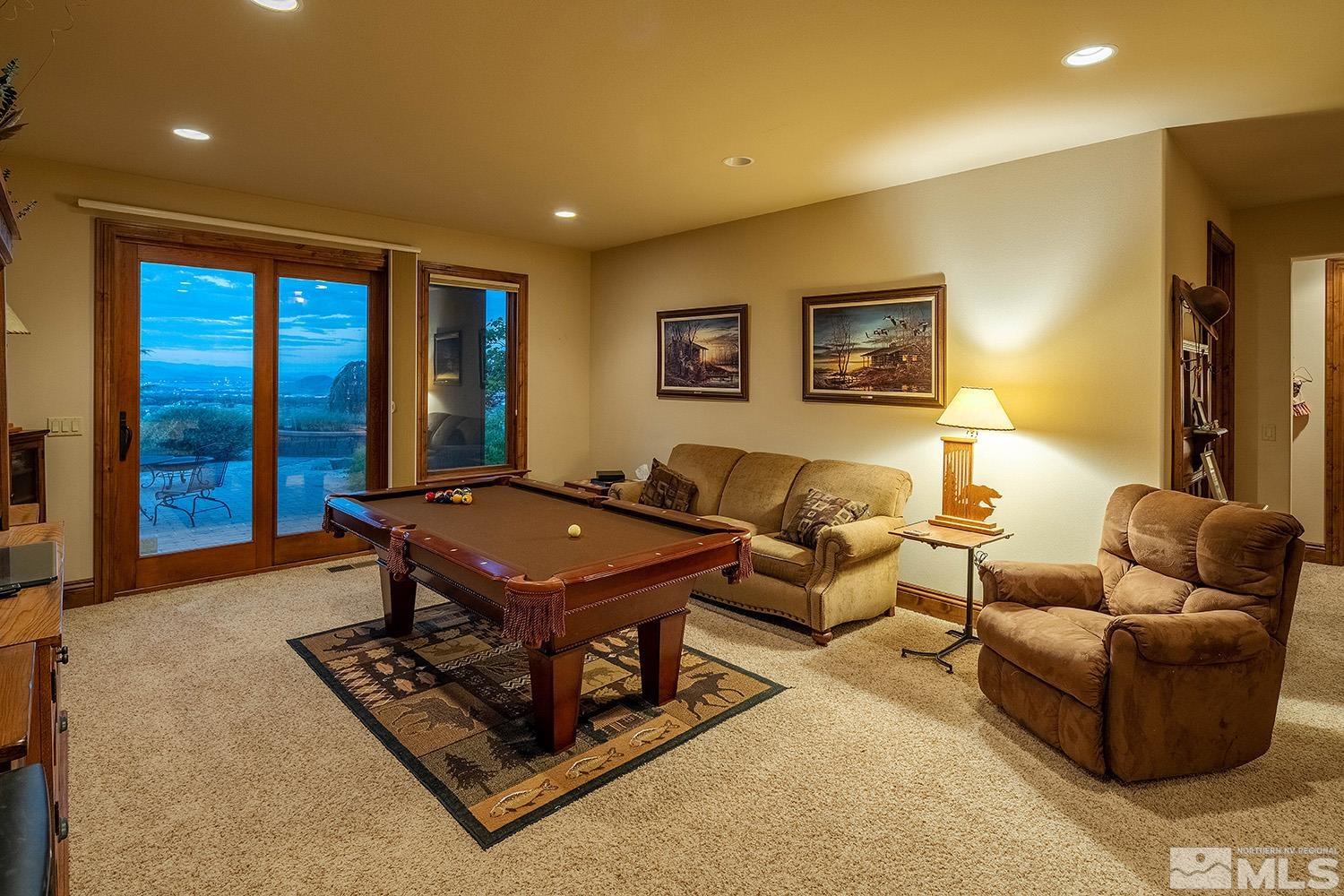 3745 Boulder Patch Reno, NV 89511 - Photo 21 of 40 a living room with furniture gym equipment and large window