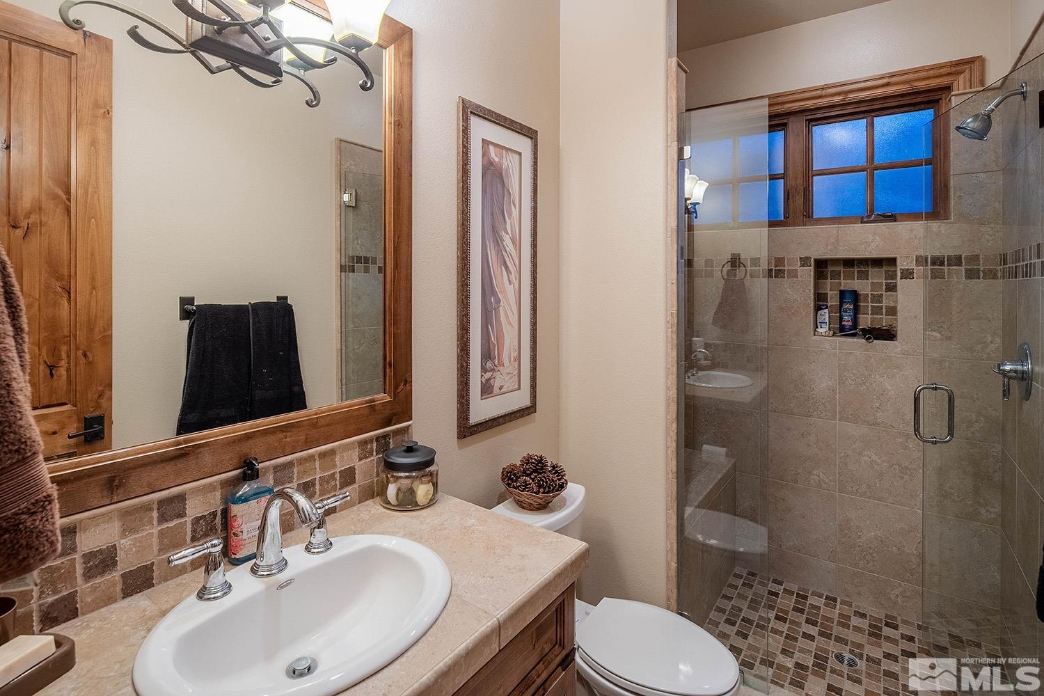 3745 Boulder Patch Reno, NV 89511 - Photo 23 of 40 a bathroom with a sink toilet and shower