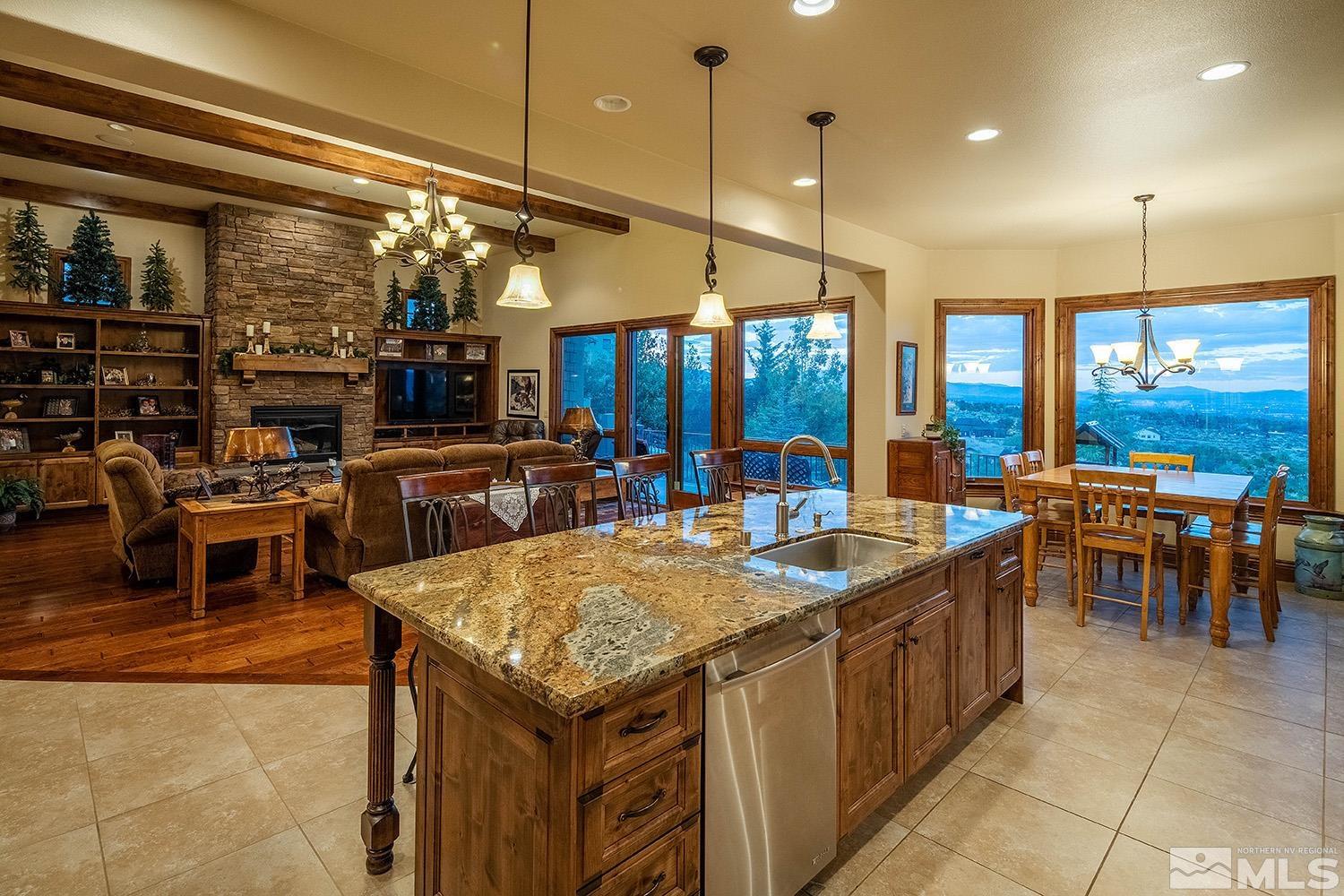 3745 Boulder Patch Reno, NV 89511 - Photo 30 of 40 a open kitchen with a table and chairs