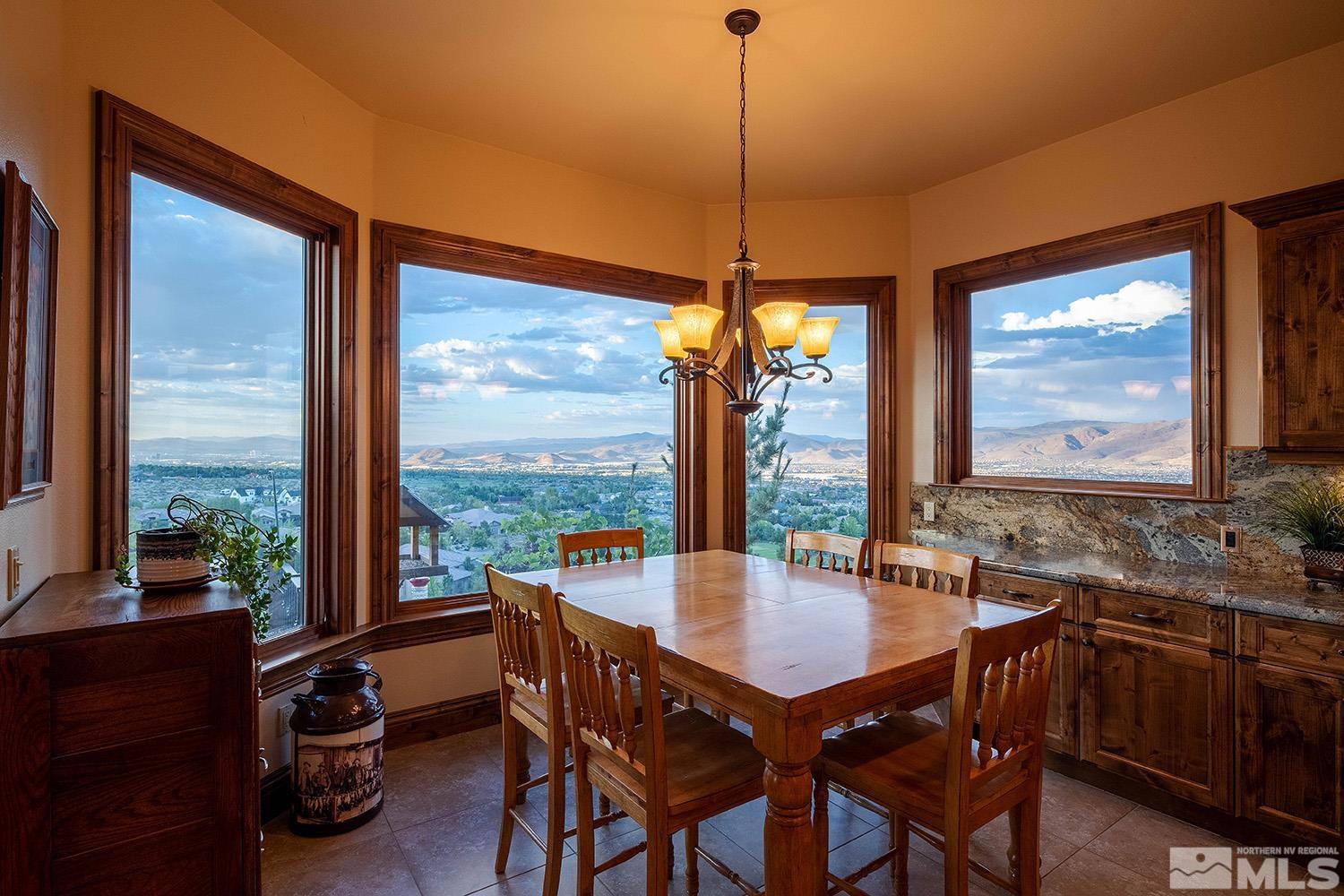 3745 Boulder Patch Reno, NV 89511 - Photo 34 of 40 a view of a dining room with furniture window and outside view
