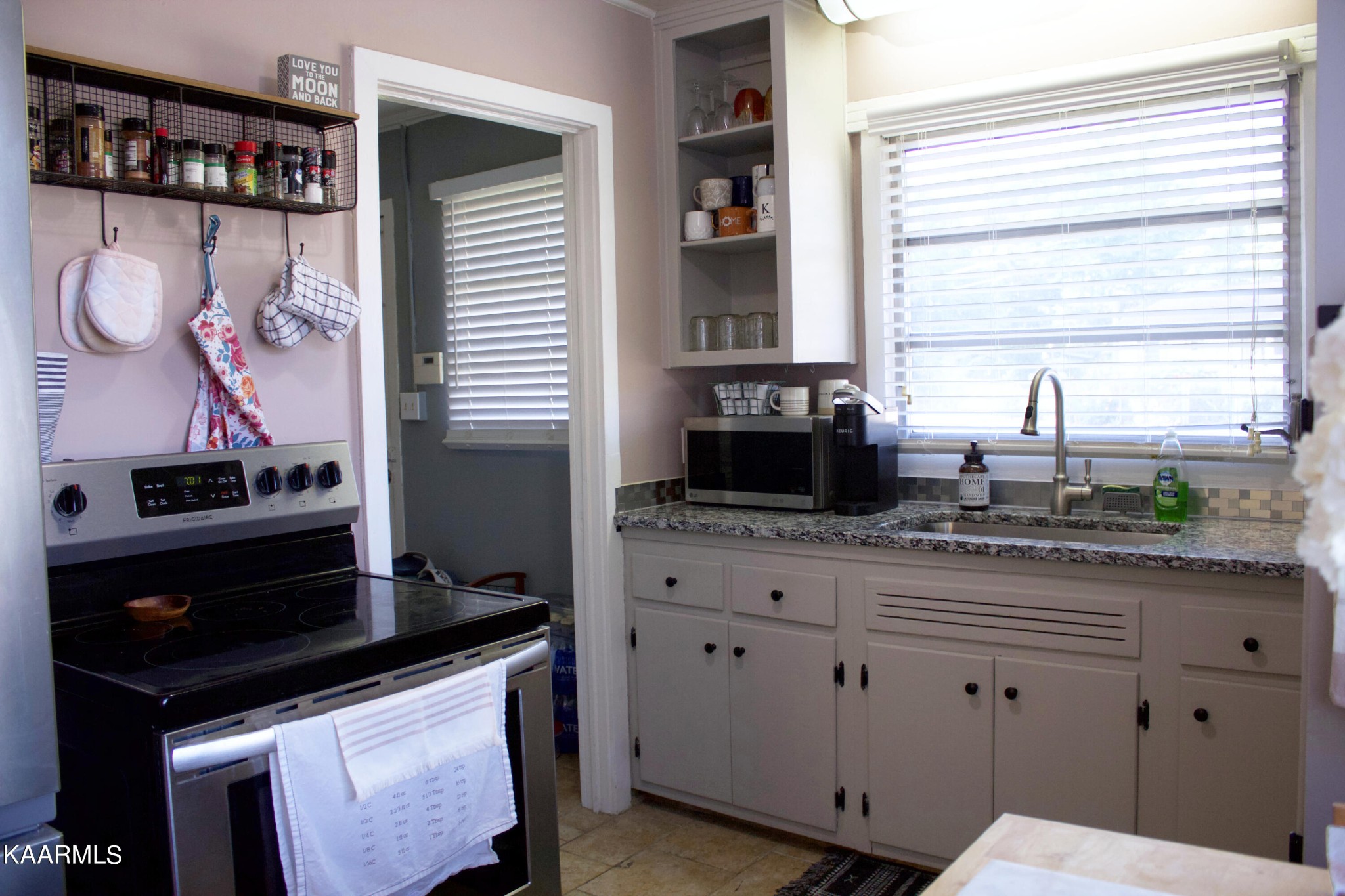 101 Norton Road Oak Ridge, TN 37830 - Photo 21 of 29 a kitchen with stainless steel appliances cabinets and a window