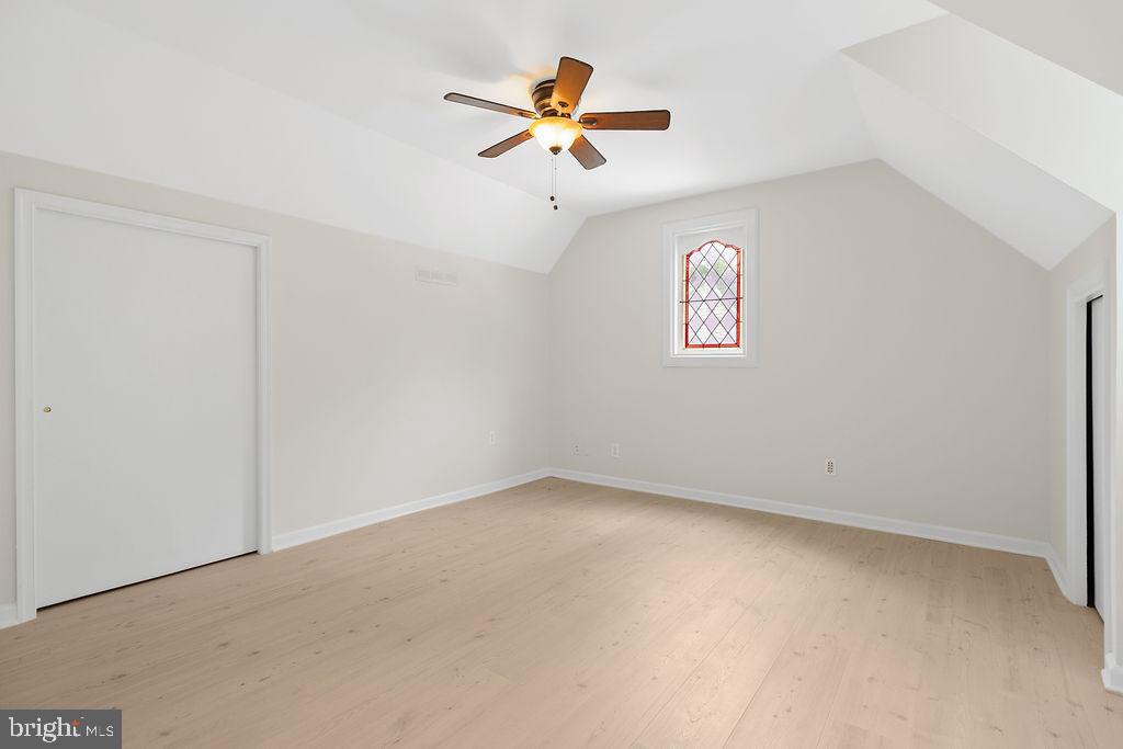 19821 Foggy Bottom Road Bluemont, VA 20135 - Photo 90 of 92 an empty room with a window and a ceiling fan