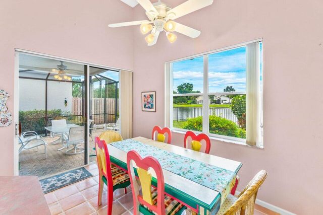 a bedroom with a bed and a table