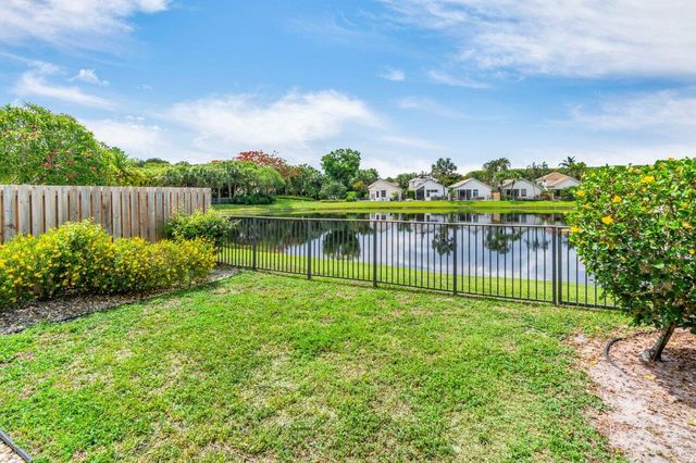 a view of a garden with a lake view