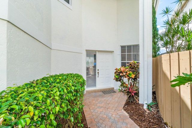 a plant is in front of a house