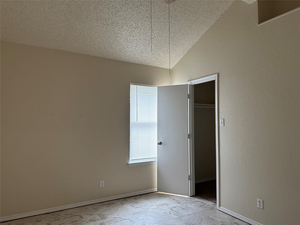 7629 Misty Ridge Drive North Fort Worth, TX 76137 - Photo 14 of 16 a view of an empty room