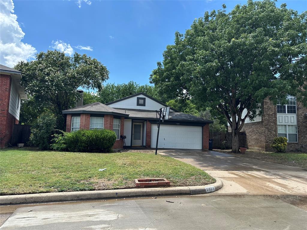 7629 Misty Ridge Drive North Fort Worth, TX 76137 - Photo 2 of 16 a view of a house with a yard