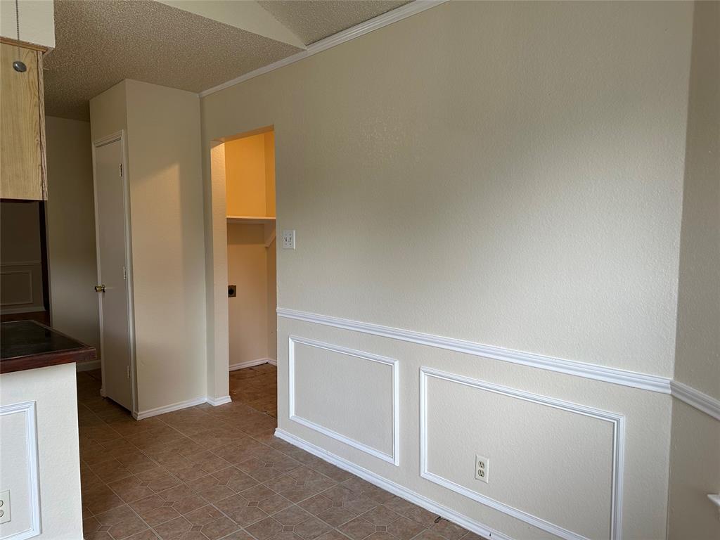 7629 Misty Ridge Drive North Fort Worth, TX 76137 - Photo 10 of 16 a view of an empty room