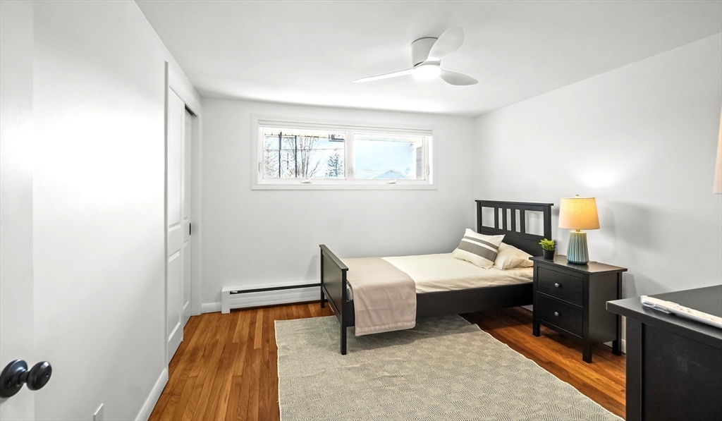 67 Montgomery Road Swansea, MA 02777 - Photo 16 of 41 a bedroom with a bed and a window