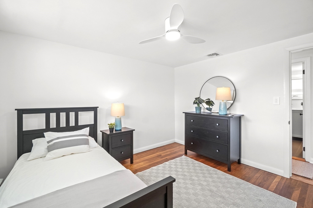67 Montgomery Road Swansea, MA 02777 - Photo 17 of 41 a bed room with a bed and a dresser