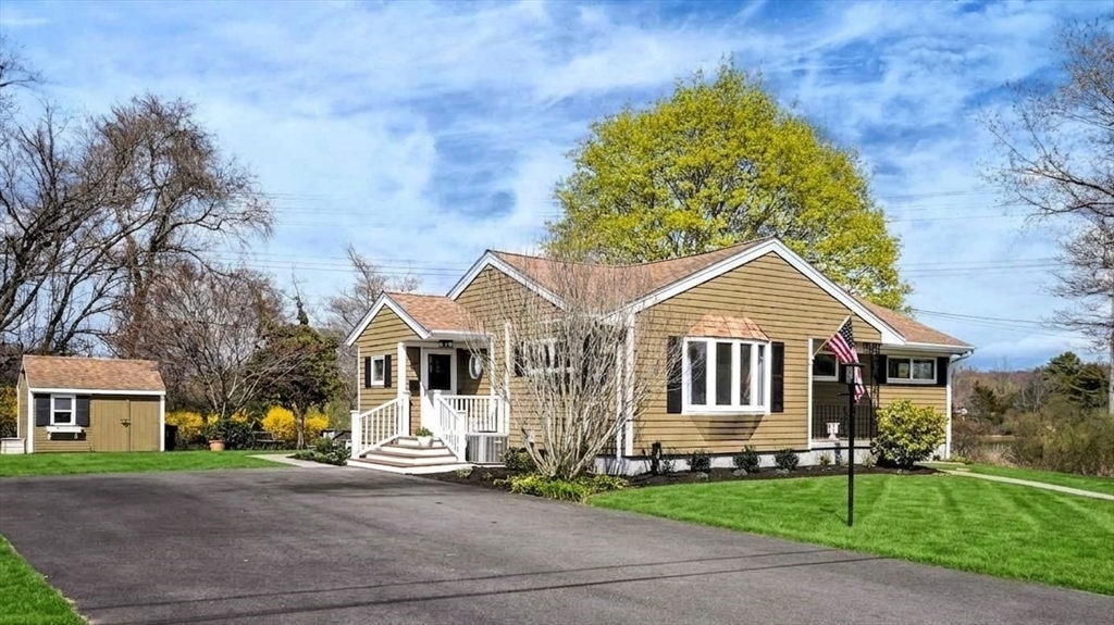 67 Montgomery Road Swansea, MA 02777 - Photo 2 of 41 a front view of a house with a garden
