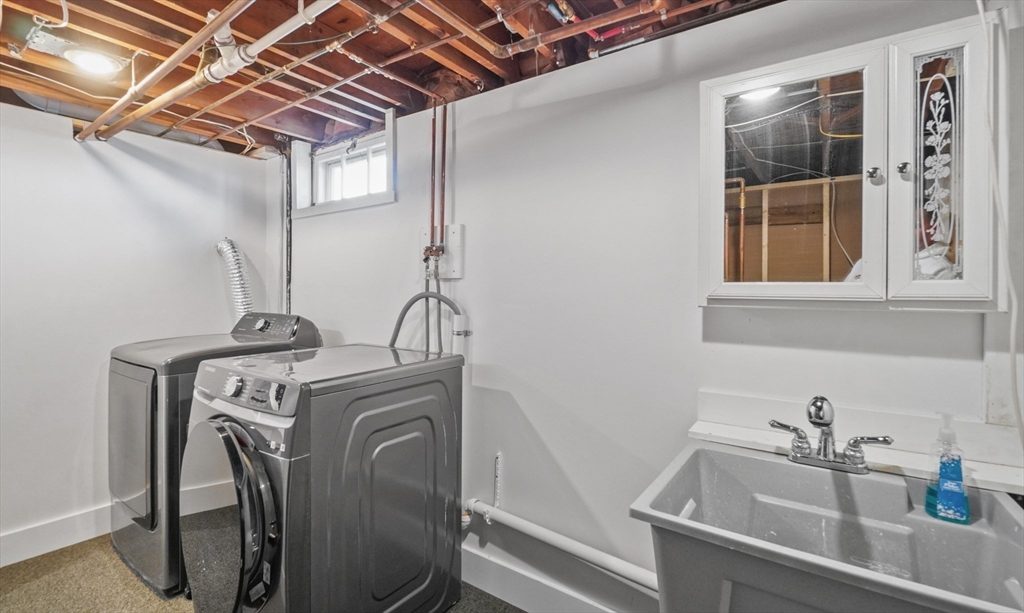 67 Montgomery Road Swansea, MA 02777 - Photo 22 of 41 a utility room with sink dryer and washer
