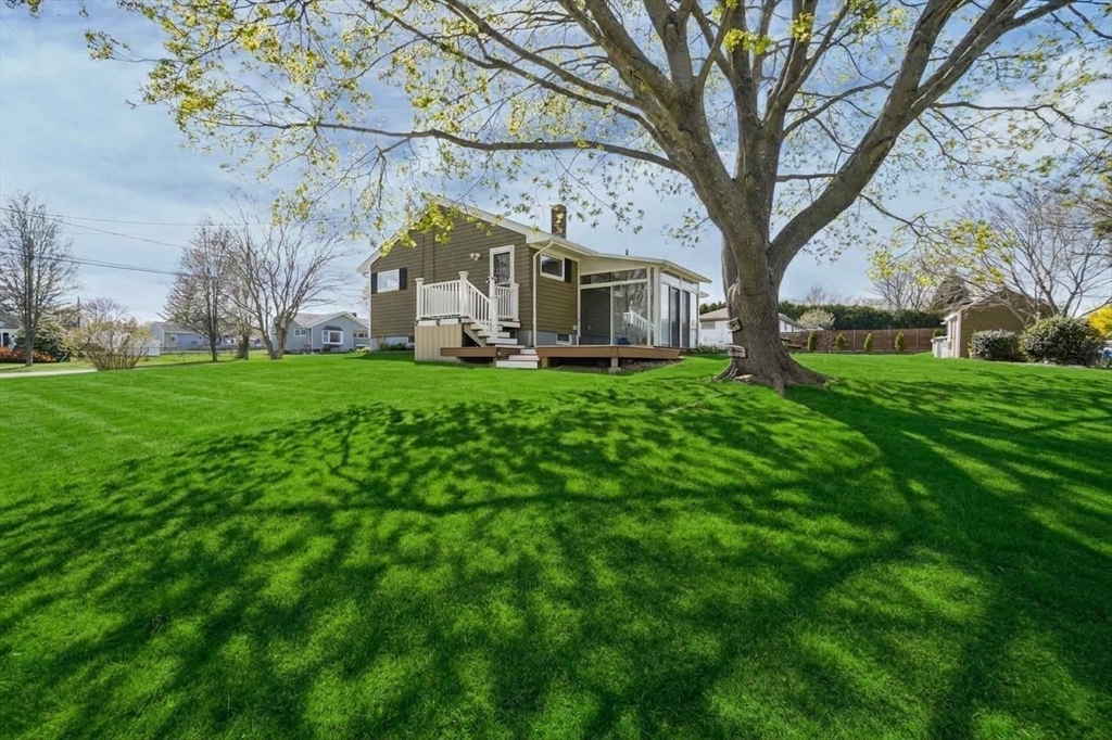 67 Montgomery Road Swansea, MA 02777 - Photo 27 of 41 a view of a house with a yard