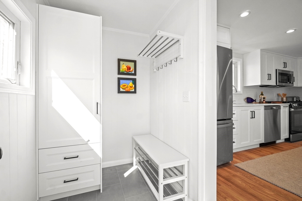 67 Montgomery Road Swansea, MA 02777 - Photo 3 of 41 a view of kitchen and wooden floor