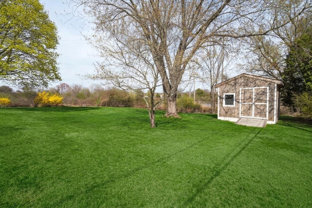 67 Montgomery Road Swansea, MA 02777 - Photo 39 of 41 a view of a house with a yard