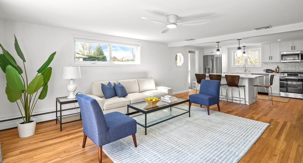 67 Montgomery Road Swansea, MA 02777 - Photo 9 of 41 a living room with furniture and a wooden floor