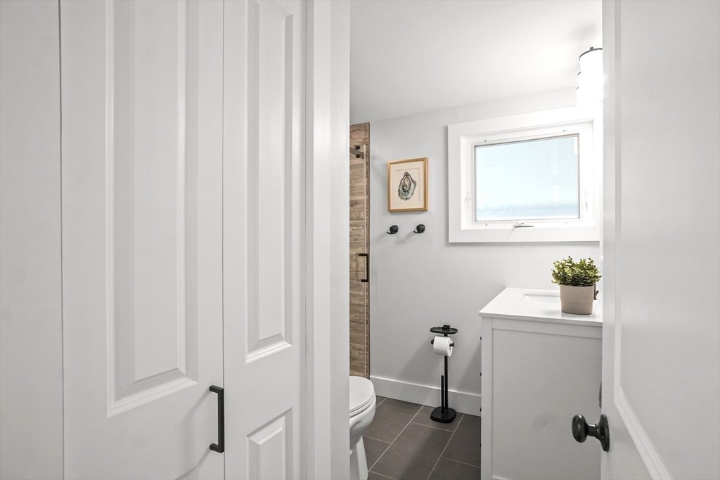 67 Montgomery Road Swansea, MA 02777 - Photo 10 of 41 a room that has a window in it