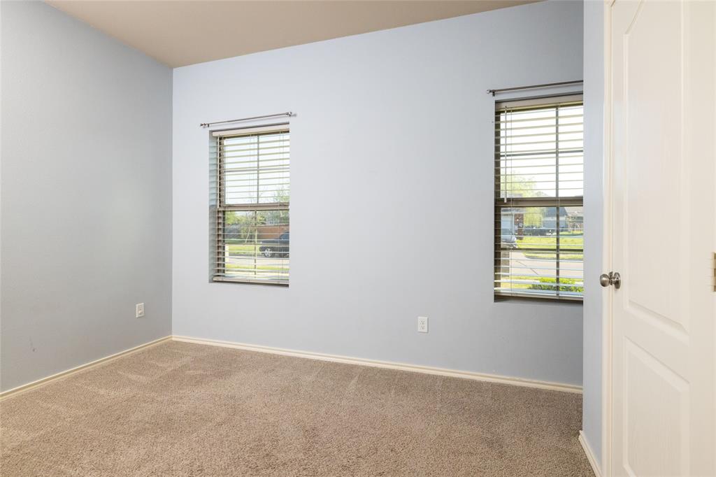 121 Mitchell Circle Terrell, TX 75160 - Photo 13 of 26 an empty room with windows